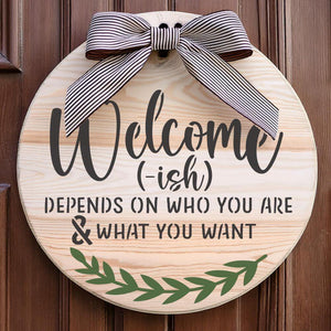 Welcome-ish Round Sign Stencil painted onto a wooden round door sign